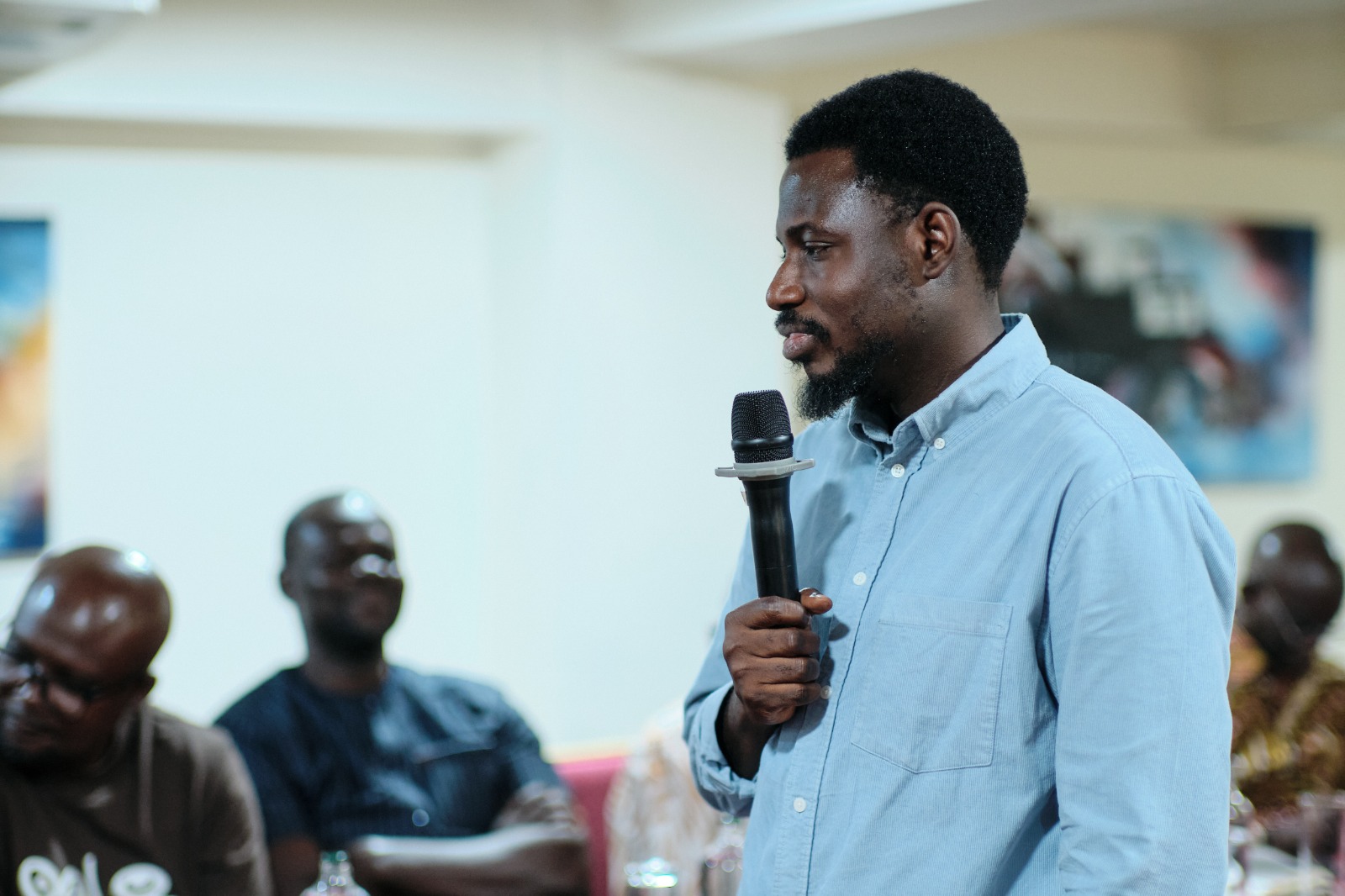 Dr. Asante-Darko answering questions from workshop participants